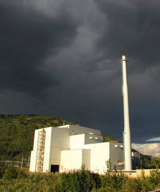 Stormy clouds over the Healy "Clean Coal" Plant seem to be predicting its future. Photo courtesy of Bretwood Higman, Erin McKittrick, Ground Truth Trekking