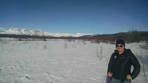 Kendall enjoyed many outings to experience Alaska. Here she is shoeshoeing in Denali State Park with the Denali Range in the background. Photo courtesy of Kendall Hamilton.