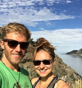 Dave and Kat taking heart in the wild during a sunny bike ride from Anchorage to Girdwood.