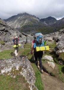 Michelle and Ranger B go hiking on the Reed Lakes trail in Hatcher Pass.