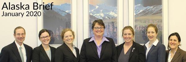 A formal photo of our legal team, but change is coming and staff transitions are underway.